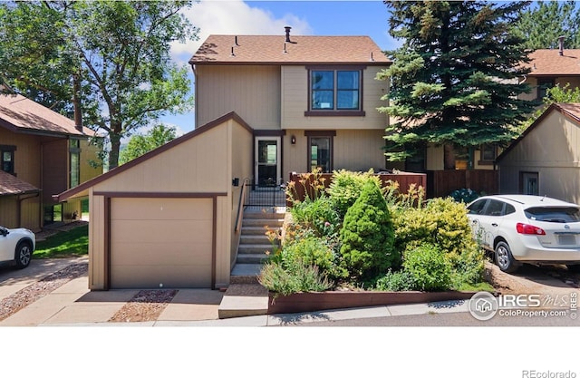 1620 Bradley Ct, Boulder, CO 80305 - townhome / multi-family property with driveway and a garage