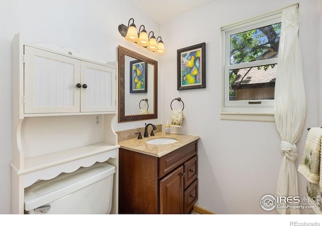 1620 Bradley Ct, Boulder, CO 80305 - bathroom with vanity and toilet