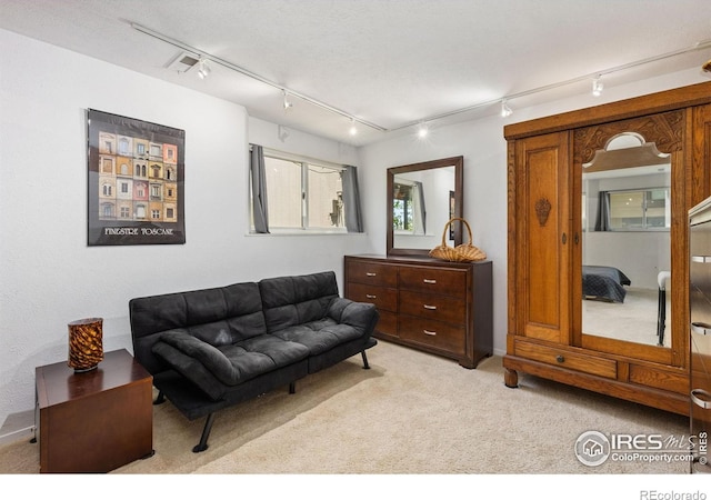 1620 Bradley Ct, Boulder, CO 80305 - living area featuring carpet and rail lighting