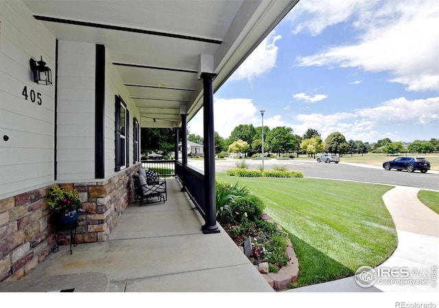 405 Ridgeview Ct, Johnstown, CO 80534 - porch with a lawn