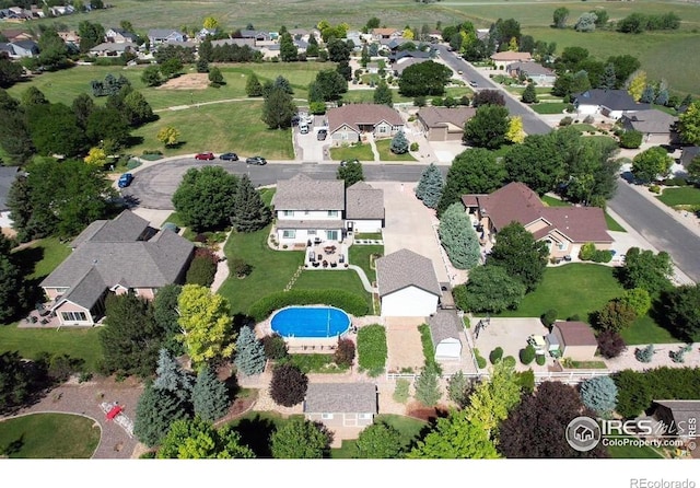 405 Ridgeview Ct, Johnstown, CO 80534 - aerial perspective of suburban area with a pool