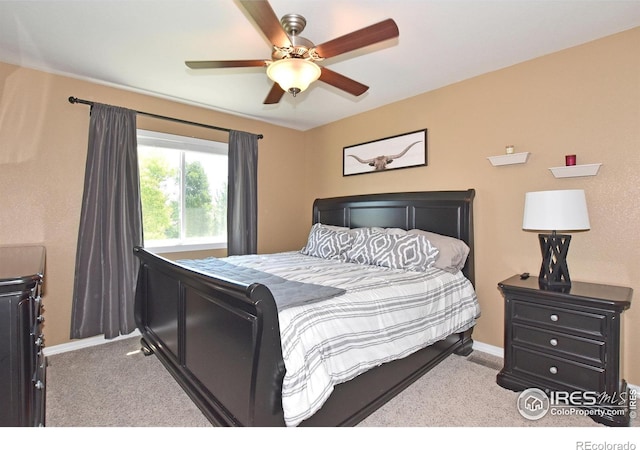 405 Ridgeview Ct, Johnstown, CO 80534 - carpeted bedroom featuring baseboards and ceiling fan