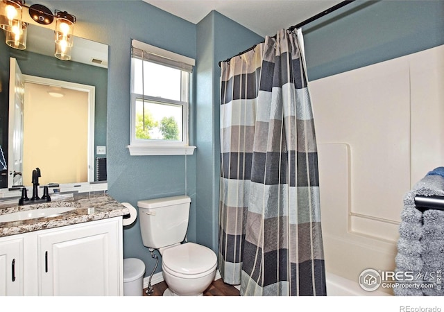 405 Ridgeview Ct, Johnstown, CO 80534 - bathroom featuring vanity and shower / tub combo