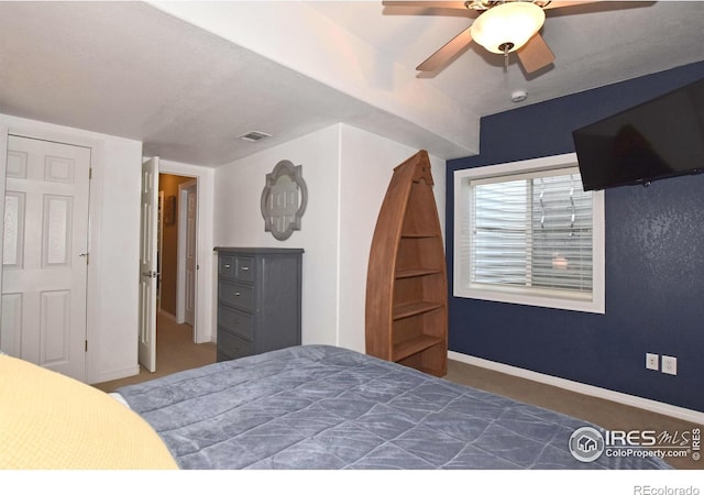 405 Ridgeview Ct, Johnstown, CO 80534 - carpeted bedroom featuring baseboards and ceiling fan