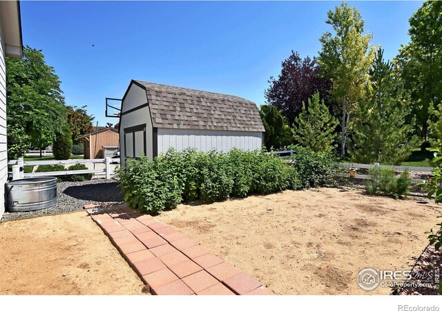 405 Ridgeview Ct, Johnstown, CO 80534 - view of yard with a storage unit