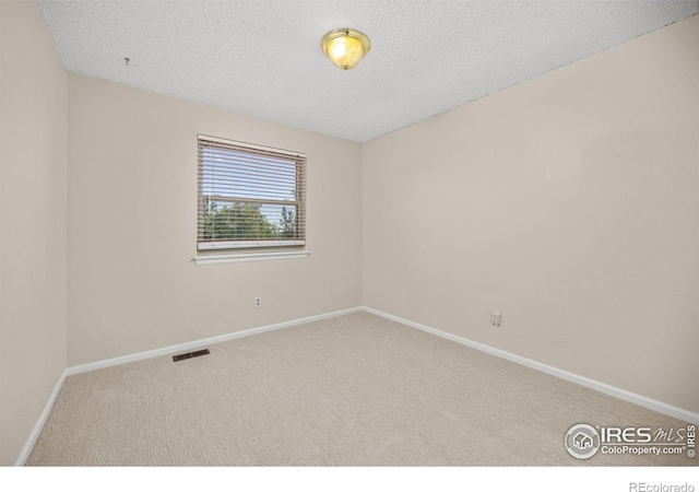 253 W Cedar Way, Louisville, CO 80027 - empty room featuring carpet and a textured ceiling