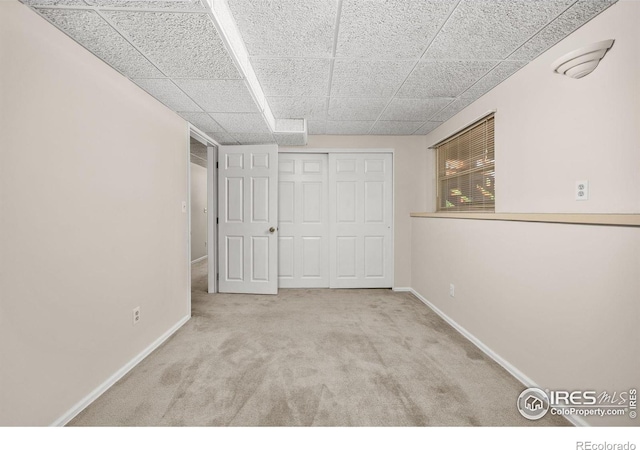 253 W Cedar Way, Louisville, CO 80027 - below grade area featuring carpet floors and a drop ceiling