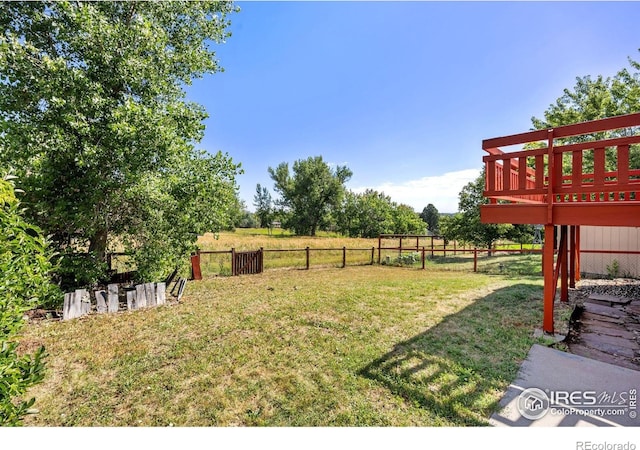 253 W Cedar Way, Louisville, CO 80027 - view of yard featuring a deck