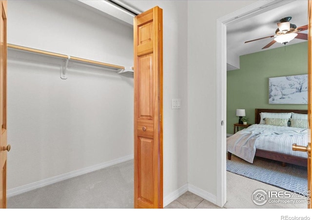 5220 Boardwalk Dr Unit 22, Fort Collins, CO 80525 - carpeted bedroom featuring baseboards and ceiling fan