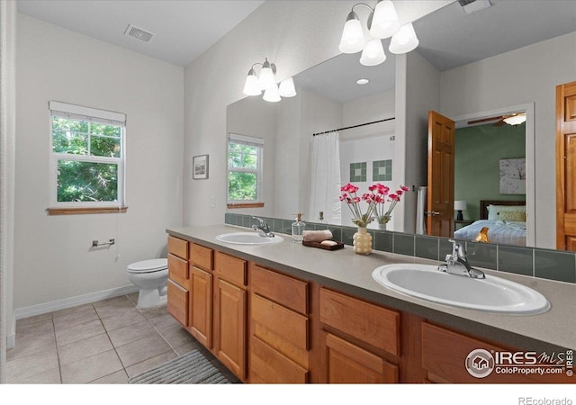 5220 Boardwalk Dr Unit 22, Fort Collins, CO 80525 - ensuite bathroom with double vanity, tile patterned floors, and a shower with curtain