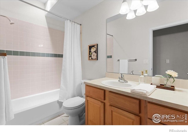 5220 Boardwalk Dr Unit 22, Fort Collins, CO 80525 - full bathroom with vanity, shower / bath combination with curtain, tile patterned flooring, and a chandelier
