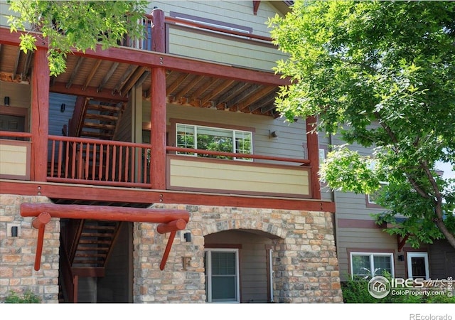 5220 Boardwalk Dr Unit 22, Fort Collins, CO 80525 - view of side of home with stone siding
