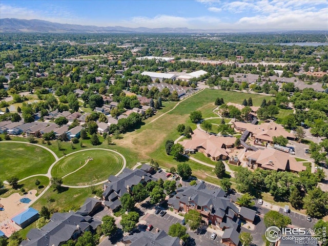 5220 Boardwalk Dr Unit 22, Fort Collins, CO 80525 - aerial overview of property's location with a mountain backdrop and nearby suburban area