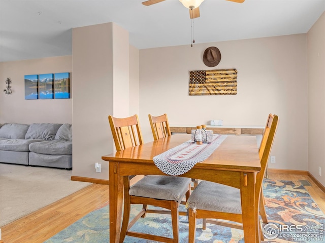 1695 Gray Hawk Ct, Estes Park, CO 80517 - dining area with light wood-style flooring and a ceiling fan