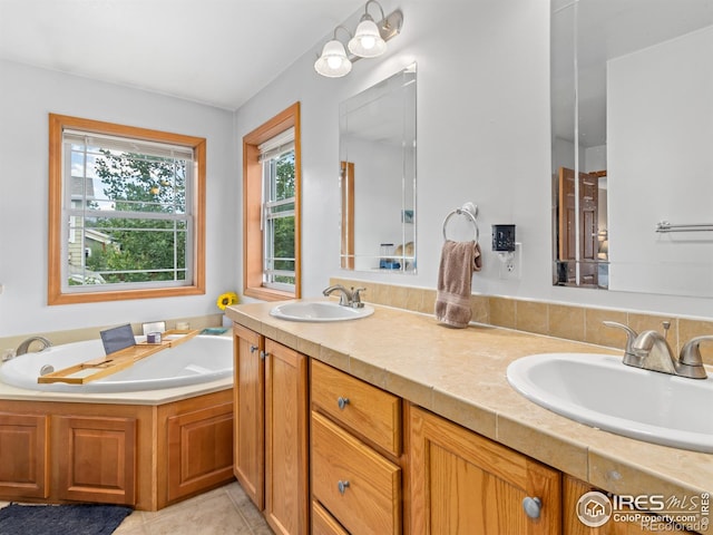 1695 Gray Hawk Ct, Estes Park, CO 80517 - full bath with double vanity, a garden tub, and tile patterned flooring