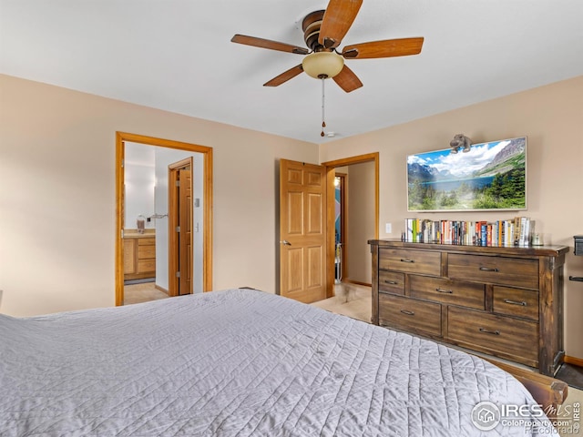 1695 Gray Hawk Ct, Estes Park, CO 80517 - bedroom with light carpet, a ceiling fan, and connected bathroom