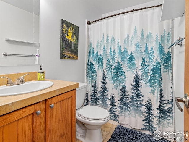 1695 Gray Hawk Ct, Estes Park, CO 80517 - bathroom with vanity, tile patterned flooring, and curtained shower