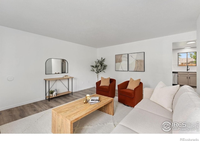 530 Mount Evans St, Longmont, CO 80504 - living room with wood finished floors and baseboards