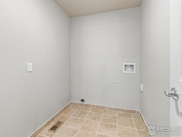 3038 County Fair Ln Unit 1, Fort Collins, CO 80528 - laundry area with hookup for a washing machine and tile patterned flooring