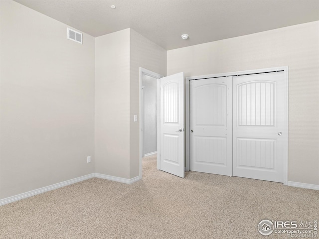3038 County Fair Ln Unit 1, Fort Collins, CO 80528 - unfurnished bedroom featuring light carpet and a closet