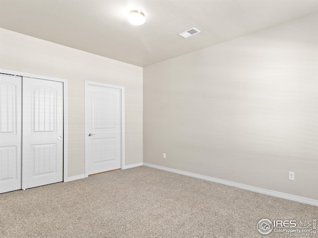 3038 County Fair Ln Unit 1, Fort Collins, CO 80528 - unfurnished bedroom featuring carpet and a closet