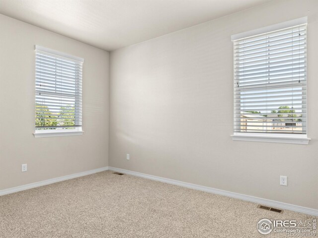3038 County Fair Ln Unit 1, Fort Collins, CO 80528 - carpeted spare room featuring baseboards