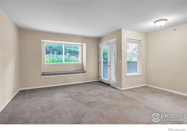1830 W Centennial Dr Unit 108, Louisville, CO 80027 - empty room with carpet flooring