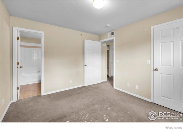 1830 W Centennial Dr Unit 108, Louisville, CO 80027 - unfurnished bedroom with carpet and ensuite bath