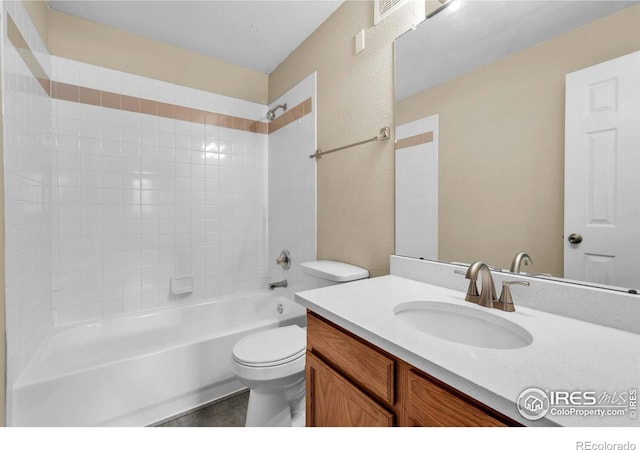 1830 W Centennial Dr Unit 108, Louisville, CO 80027 - full bath featuring shower / bathtub combination, vanity, and a textured wall