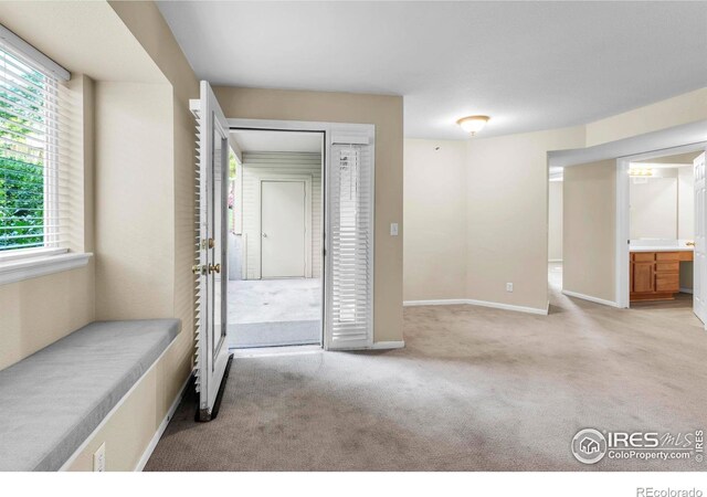 1830 W Centennial Dr Unit 108, Louisville, CO 80027 - carpeted spare room featuring plenty of natural light