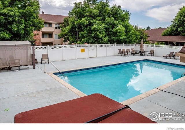1830 W Centennial Dr Unit 108, Louisville, CO 80027 - view of pool with a patio