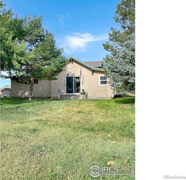 329 S Wynona Ave, Holyoke, CO 80734 - back of property featuring a yard