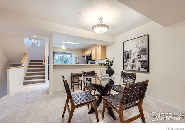 4919 Noble Park Pl, Boulder, CO 80301 - dining room with light carpet and stairs