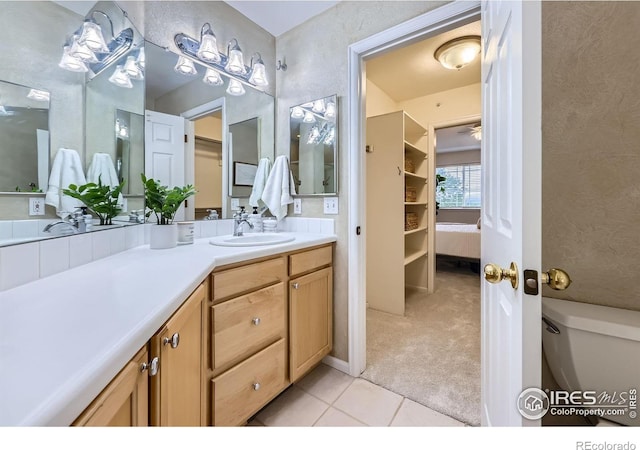 4919 Noble Park Pl, Boulder, CO 80301 - ensuite bathroom with vanity and tile patterned floors