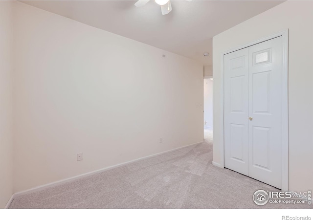 4919 Noble Park Pl, Boulder, CO 80301 - unfurnished bedroom with light carpet, a closet, and a ceiling fan