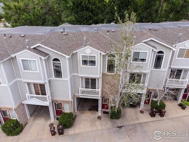 4919 Noble Park Pl, Boulder, CO 80301 - rear view of house featuring a shingled roof