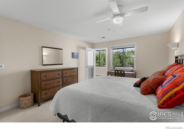 337 Arapahoe Ave Unit 303, Boulder, CO 80302 - carpeted bedroom with baseboards and ceiling fan