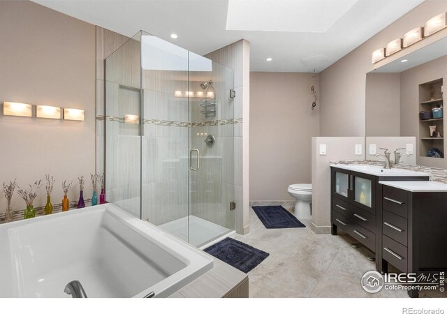 337 Arapahoe Ave Unit 303, Boulder, CO 80302 - bathroom with vanity, a shower stall, a bath, and recessed lighting