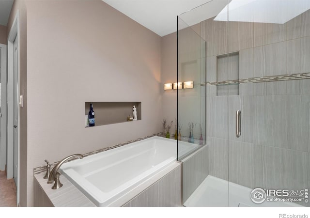 337 Arapahoe Ave Unit 303, Boulder, CO 80302 - full bathroom with a shower stall and a garden tub