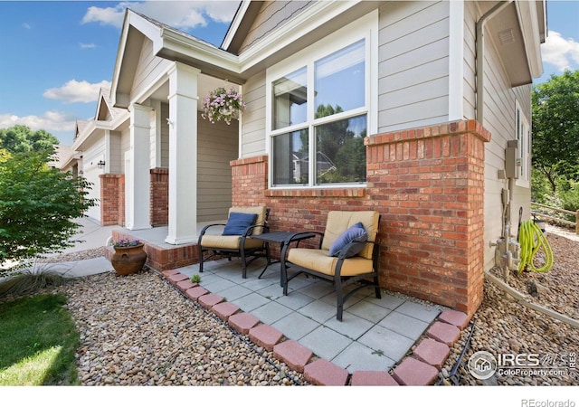 8119 Lighthouse Ln, Windsor, CO 80528 - view of patio with a garage