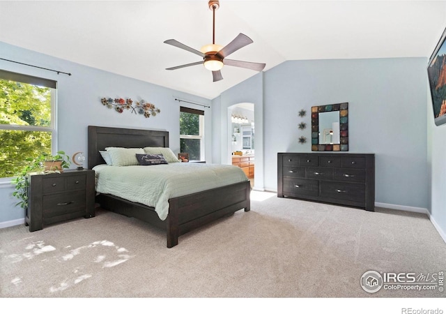 8119 Lighthouse Ln, Windsor, CO 80528 - carpeted bedroom with multiple windows, vaulted ceiling, arched walkways, and a ceiling fan