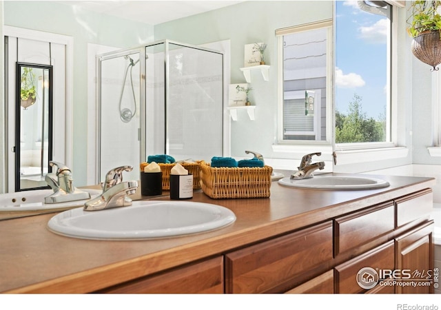 8119 Lighthouse Ln, Windsor, CO 80528 - bathroom with double vanity and a shower stall