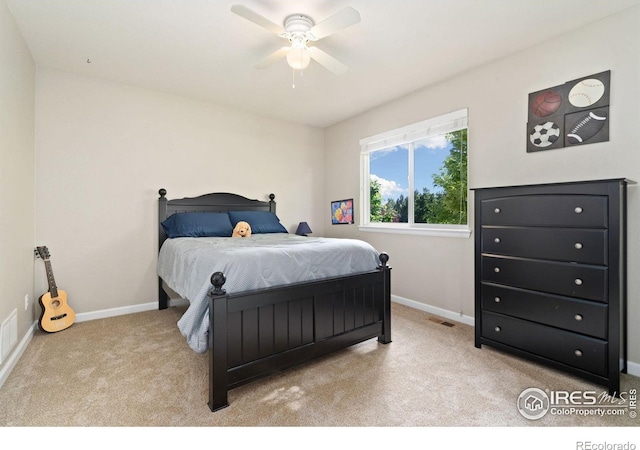8119 Lighthouse Ln, Windsor, CO 80528 - carpeted bedroom with baseboards and a ceiling fan