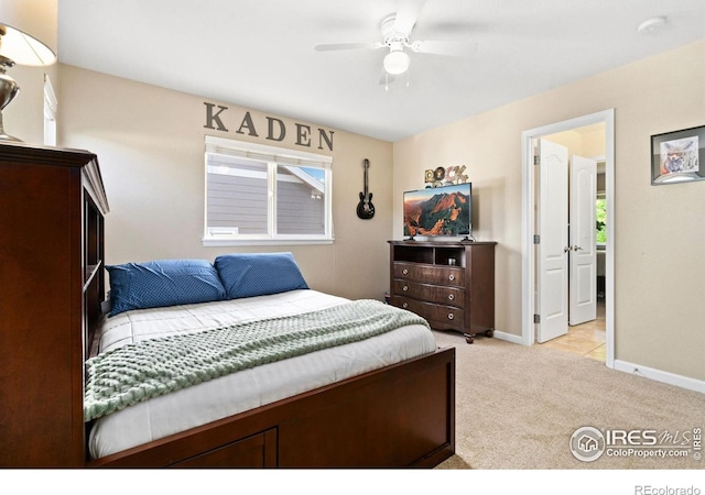 8119 Lighthouse Ln, Windsor, CO 80528 - bedroom with light colored carpet and ceiling fan
