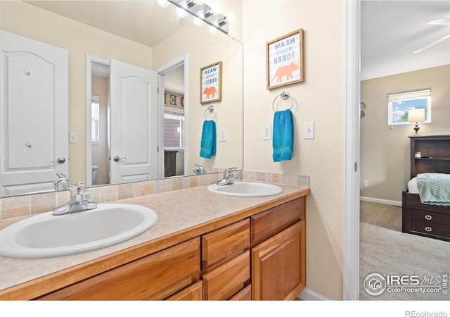 8119 Lighthouse Ln, Windsor, CO 80528 - full bathroom featuring double vanity and ensuite bathroom
