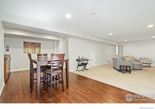 8119 Lighthouse Ln, Windsor, CO 80528 - dining area featuring recessed lighting and dark wood finished floors