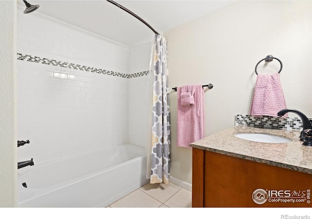8119 Lighthouse Ln, Windsor, CO 80528 - bathroom featuring tile patterned flooring, shower / tub combo with curtain, and vanity