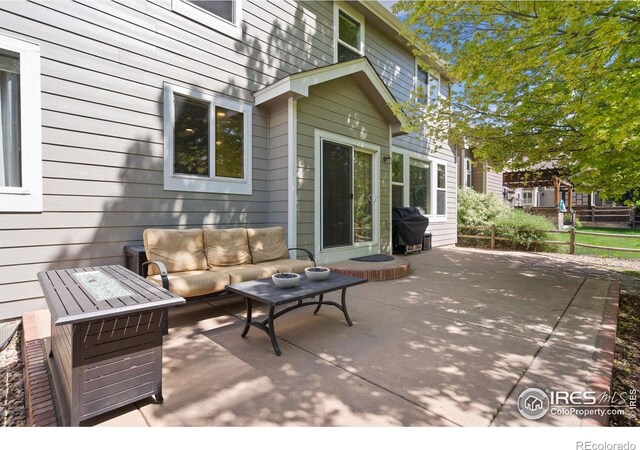 8119 Lighthouse Ln, Windsor, CO 80528 - view of patio / terrace featuring an outdoor hangout area and a grill