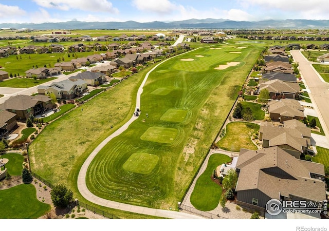 8119 Lighthouse Ln, Windsor, CO 80528 - aerial perspective of suburban area featuring a mountain backdrop and a golf club