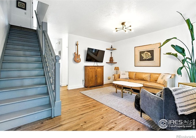 3850 Broadway St Unit 24, Boulder, CO 80304 - living room with wood finished floors and stairs